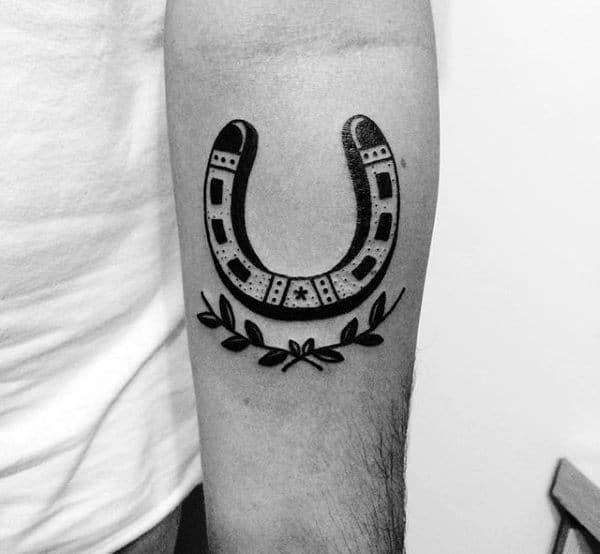 traditional-black-ink-horseshoe-with-olive-branch-mens-arm-tattoo.jpg