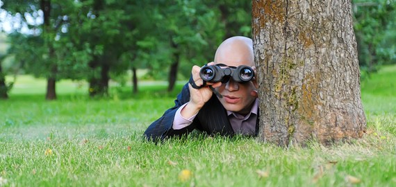 man-spying-binoculars-featured.jpg
