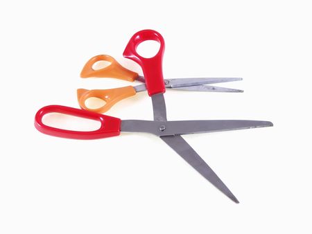 3183125-two-pairs-of-scissors-on-a-white-background-one-pair-is-open-with-a-red-handle-the-other-almost-clos.jpg