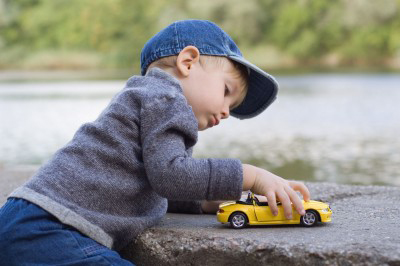 little-boy-playing-with-toy-car.jpg